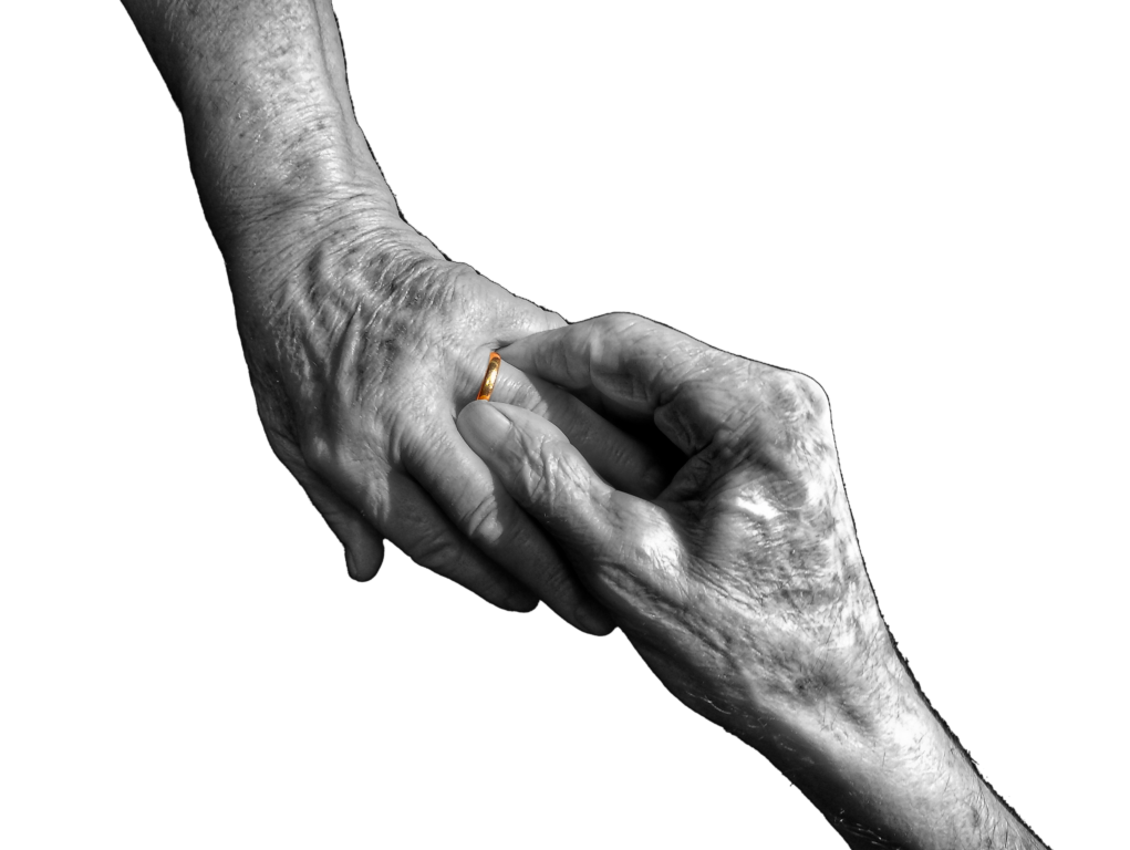 Grandad puts the ring on his wife's finger